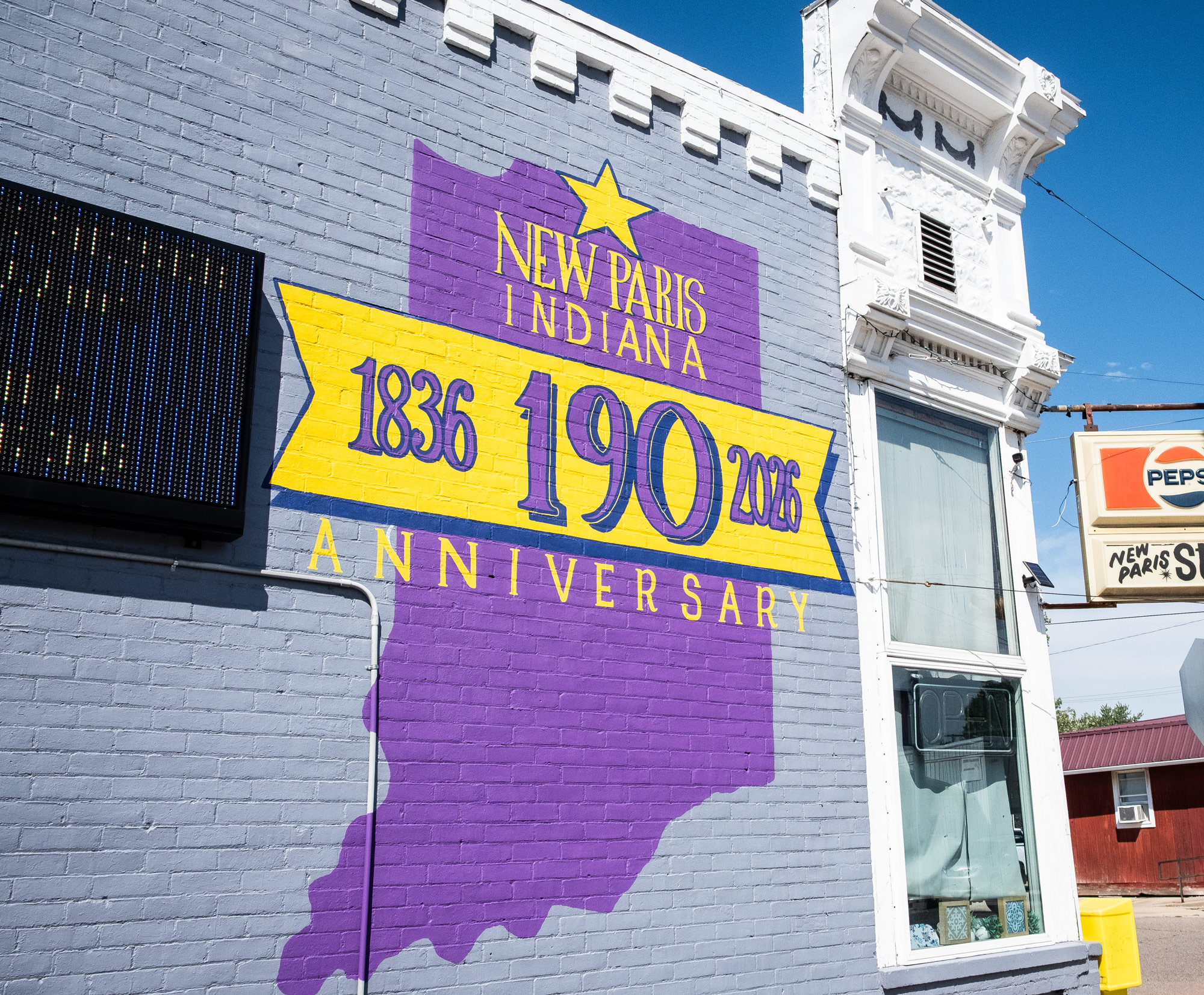 New Paris 190th Mural on Downtown New Paris Store.